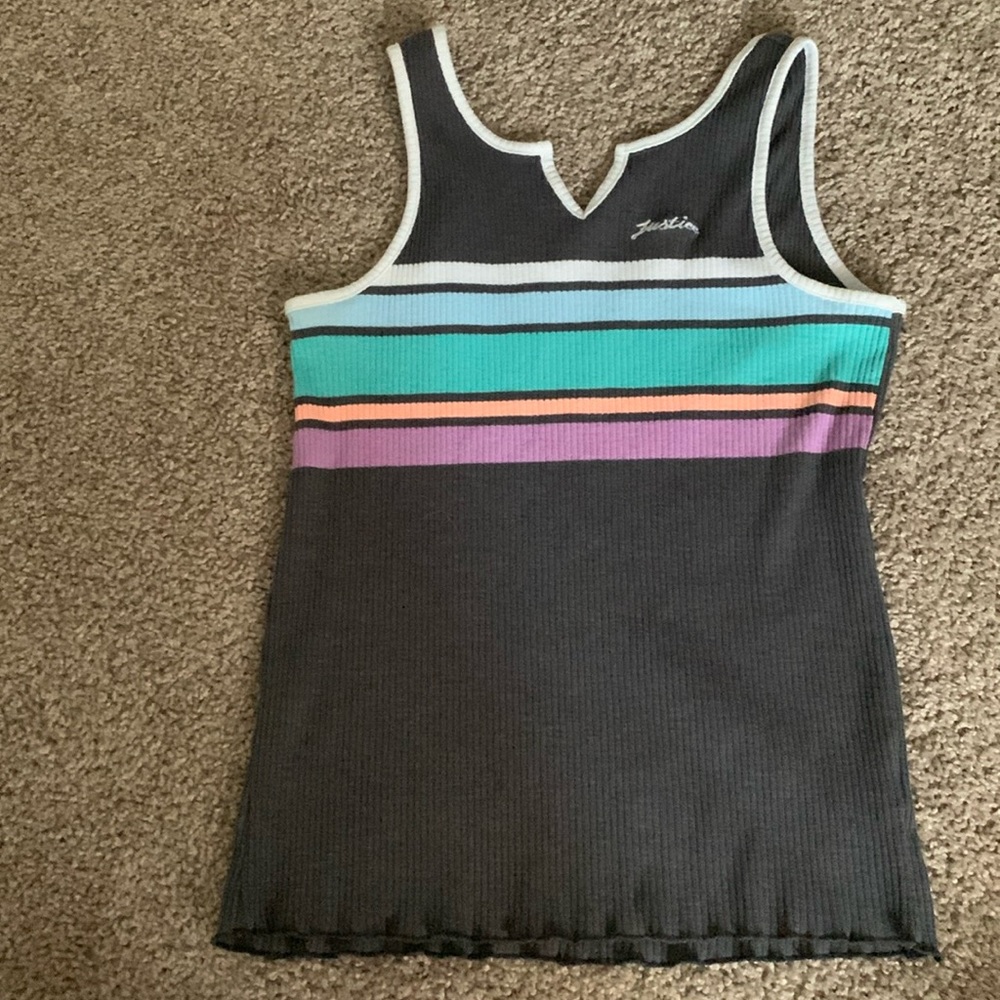 Selling a justice tank top, size XL (16-18) main colours are grey white and blue